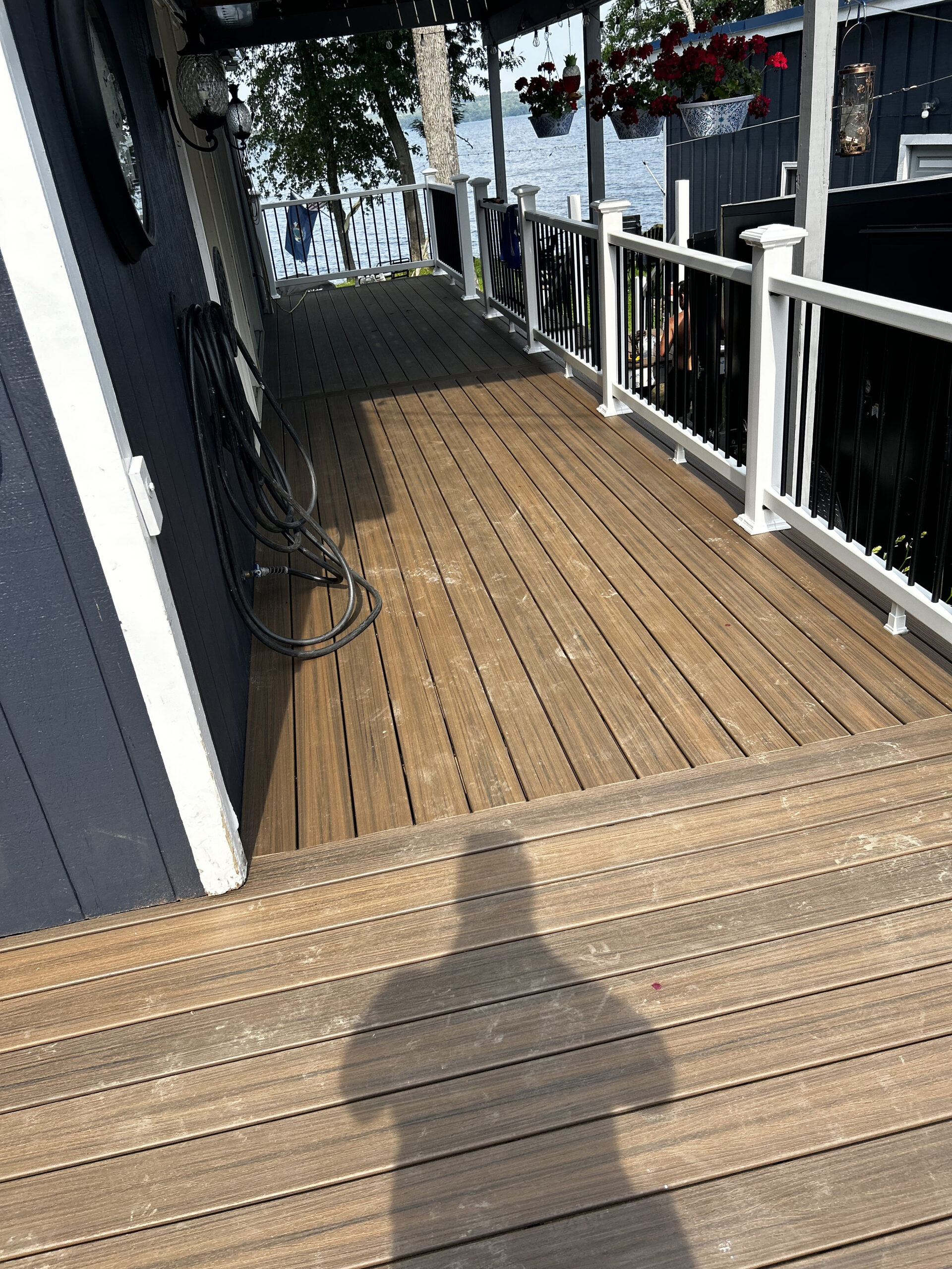 Professional deck installation in Veazie with new composite decking and railing