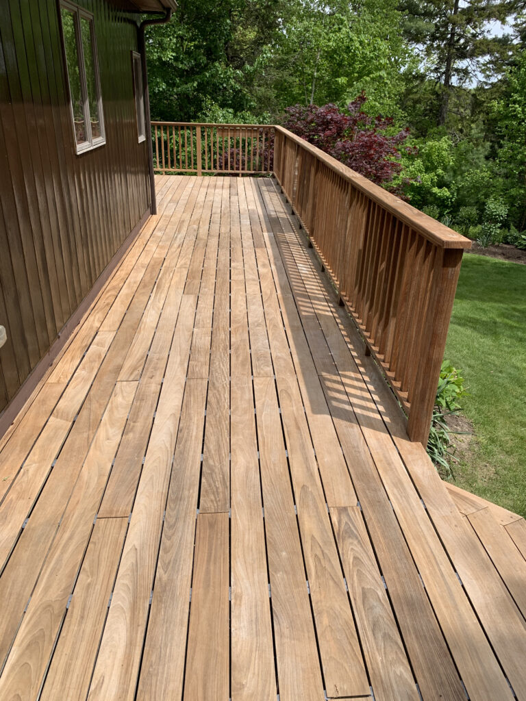 Professional deck installation in Hermon with new composite decking and railing